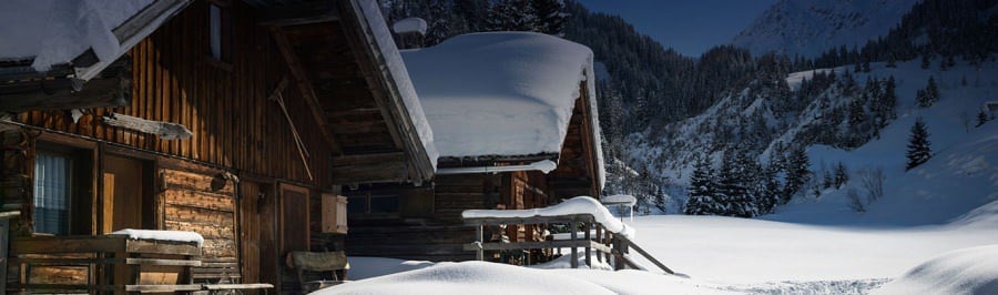 Snow covered chalets in the French Alps